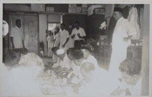 Haji K Syed Mohamed standing on the right during the annual feast given to his sincere staff